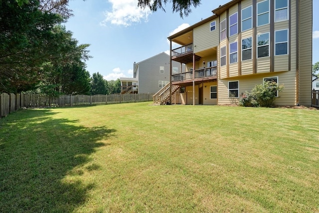 6665 Flagstone Ct, Cumming, GA 30028 - fenced backyard featuring stairway and a wooden deck