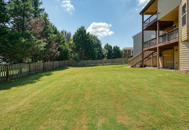 6665 Flagstone Ct, Cumming, GA 30028 - fenced backyard featuring stairway and a wooden deck