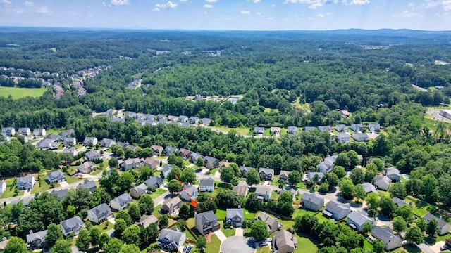 6665 Flagstone Ct, Cumming, GA 30028 - aerial view of residential area featuring a forest