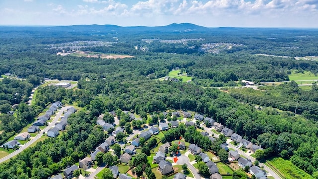 6665 Flagstone Ct, Cumming, GA 30028 - drone / aerial view of a forest and a mountain backdrop