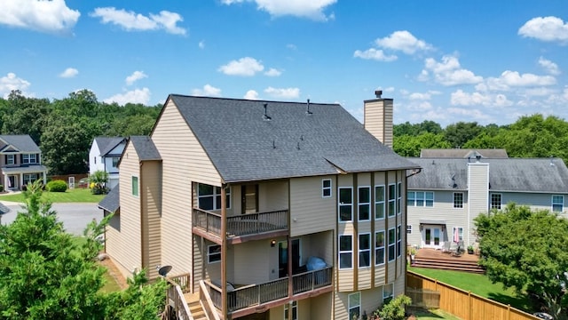 6665 Flagstone Ct, Cumming, GA 30028 - back of property with a chimney and a shingled roof