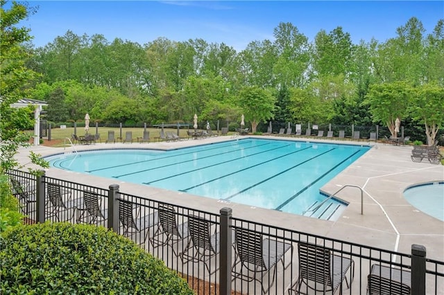 6665 Flagstone Ct, Cumming, GA 30028 - community pool with view of scattered trees
