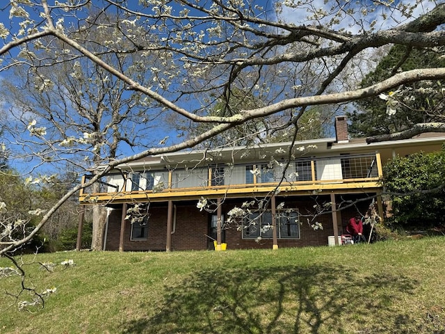 558 Old Dyer Rd, Hayesville, NC 28904 - rear view of property with brick siding, a deck, and a chimney