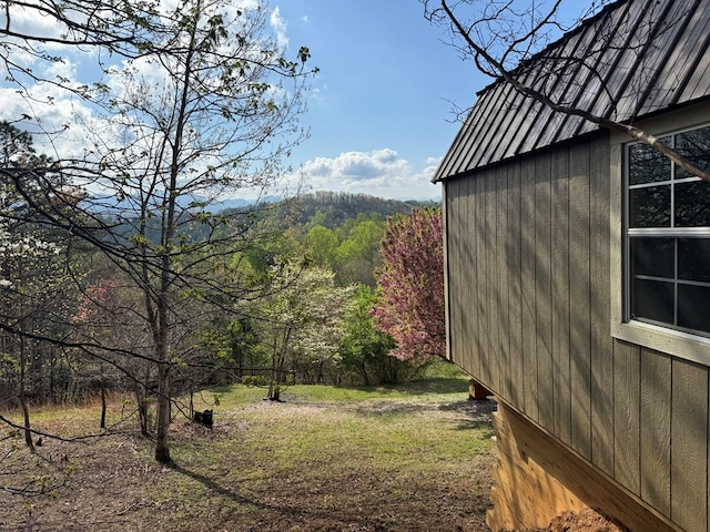 558 Old Dyer Rd, Hayesville, NC 28904 - view of yard featuring a wooded view and an outdoor structure