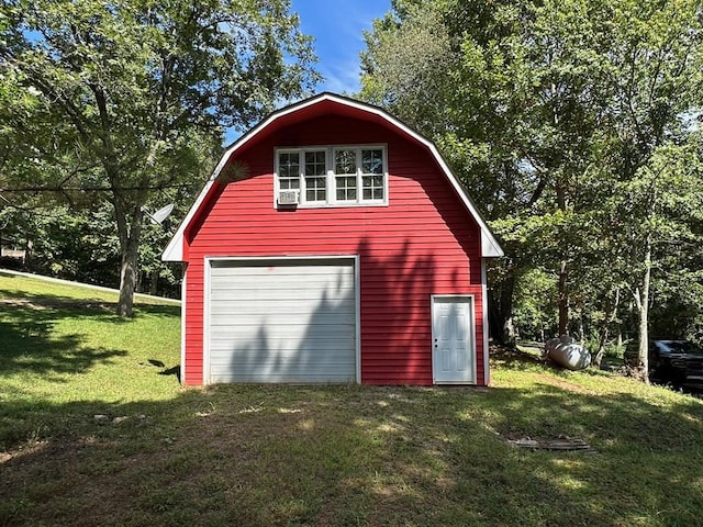 garage with a lawn