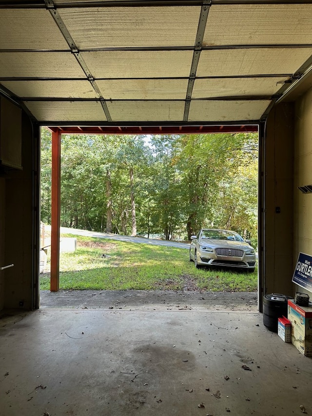 garage featuring a carport