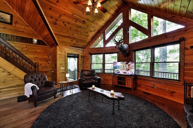 162 Grayson Pt, Blue Ridge, GA 30513 - living area featuring wooden walls, wood finished floors, a ceiling fan, wood ceiling, and high vaulted ceiling