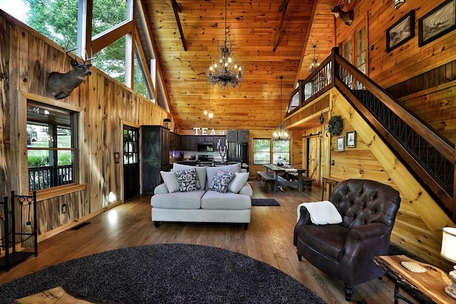 162 Grayson Pt, Blue Ridge, GA 30513 - living room featuring a chandelier, high vaulted ceiling, wooden walls, wood finished floors, and wooden ceiling