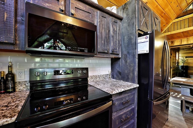 162 Grayson Pt, Blue Ridge, GA 30513 - kitchen featuring black appliances, vaulted ceiling, decorative backsplash, wooden ceiling, and dark brown cabinets