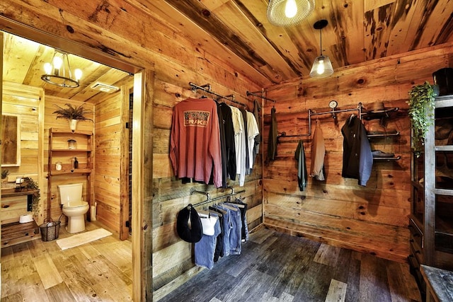 162 Grayson Pt, Blue Ridge, GA 30513 - walk in closet with hardwood / wood-style flooring and a chandelier