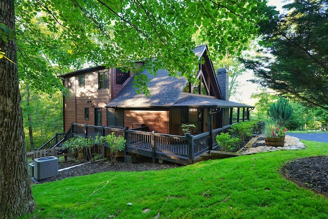 162 Grayson Pt, Blue Ridge, GA 30513 - rear view of house with central air condition unit, a lawn, roof with shingles, and a wooden deck
