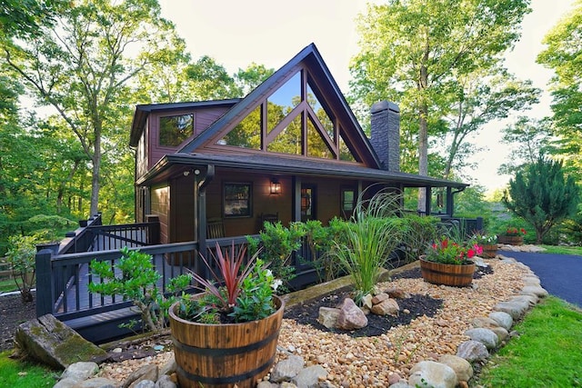 162 Grayson Pt, Blue Ridge, GA 30513 - view of front facade featuring a chimney and a porch