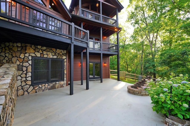 162 Grayson Pt, Blue Ridge, GA 30513 - view of patio featuring a balcony, an outdoor fire pit, and french doors