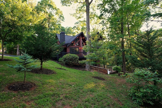 162 Grayson Pt, Blue Ridge, GA 30513 - view of green lawn with a wooden deck