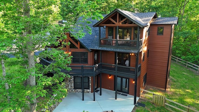 162 Grayson Pt, Blue Ridge, GA 30513 - back of property featuring a balcony, french doors, a fenced backyard, a shingled roof, and a patio
