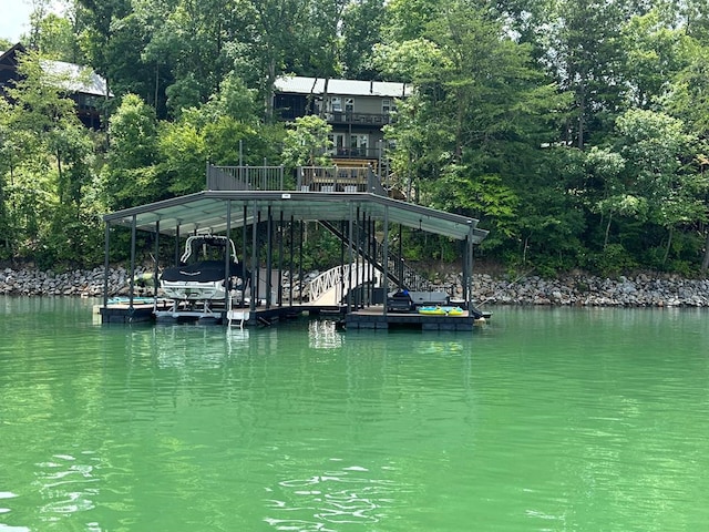 view of dock with a water view