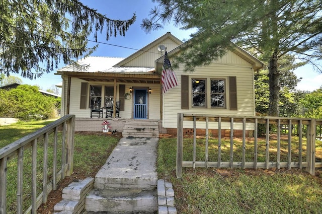 102 Riverview St, Copperhill, TN 37317 - bungalow-style home featuring covered porch and a front yard