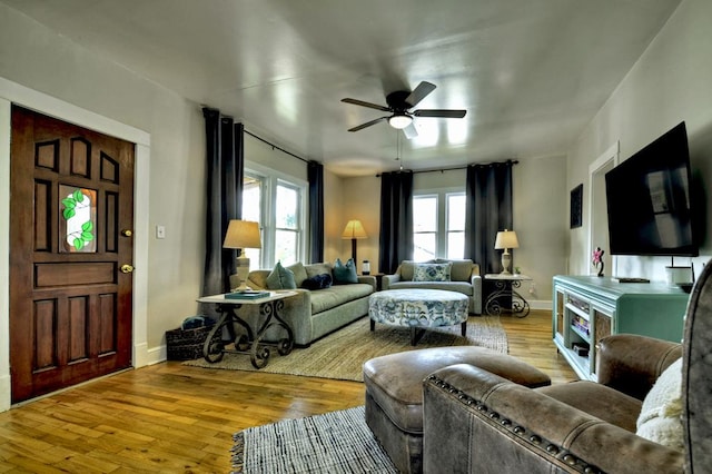 102 Riverview St, Copperhill, TN 37317 - living room featuring baseboards, ceiling fan, and wood finished floors