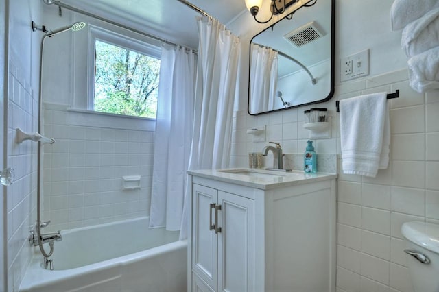 102 Riverview St, Copperhill, TN 37317 - bathroom with shower / tub combo with curtain, vanity, toilet, tile walls, and visible vents