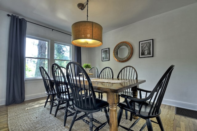 102 Riverview St, Copperhill, TN 37317 - dining space featuring baseboards, wood finished floors, and visible vents