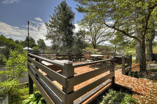 102 Riverview St, Copperhill, TN 37317 - wooden deck with outdoor dining area