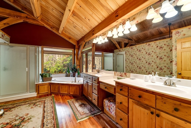 bathroom with lofted ceiling with beams, independent shower and bath, vanity, wood ceiling, and hardwood / wood-style flooring