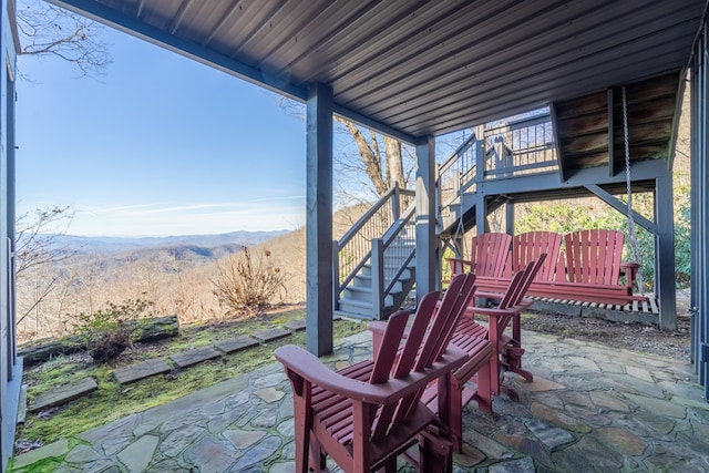 view of patio / terrace with a mountain view