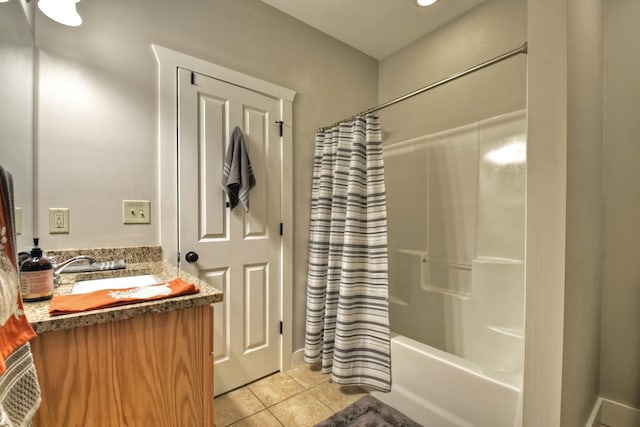 full bath featuring tile patterned flooring, shower / bath combination with curtain, and vanity