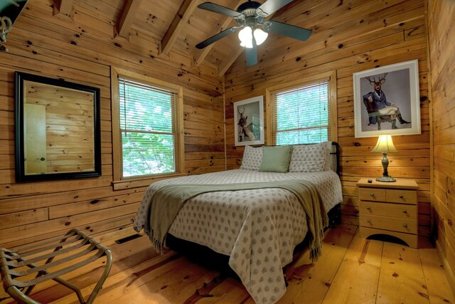 100 Smith Hill Rd, Cherry Log, GA 30522 - bedroom featuring wooden walls, light wood-style floors, ceiling fan, and wood ceiling