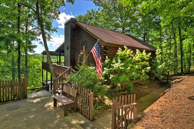 100 Smith Hill Rd, Cherry Log, GA 30522 - view of property exterior featuring log siding and stairs