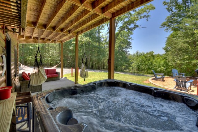 327 Dancing Trees Trl, Morganton, GA 30560 - view of patio featuring a hot tub