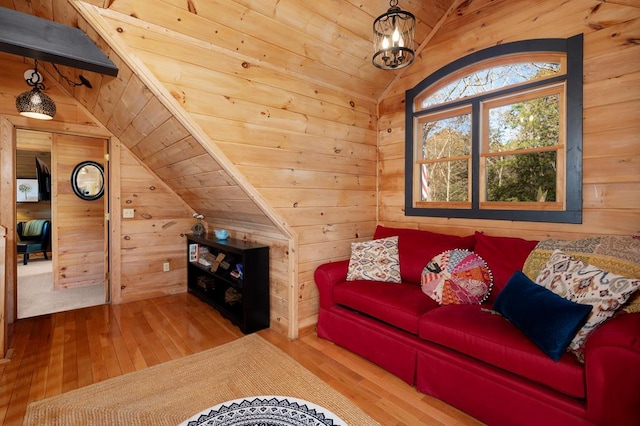 327 Dancing Trees Trl, Morganton, GA 30560 - living room with lofted ceiling, wood-type flooring, wood walls, wood ceiling, and a chandelier