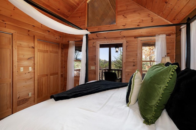 327 Dancing Trees Trl, Morganton, GA 30560 - bedroom featuring wooden ceiling, wooden walls, lofted ceiling, multiple windows, and access to exterior