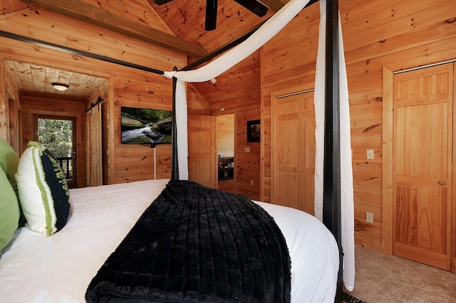 327 Dancing Trees Trl, Morganton, GA 30560 - carpeted bedroom featuring wooden walls and vaulted ceiling