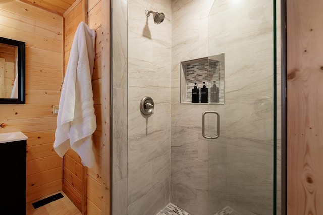327 Dancing Trees Trl, Morganton, GA 30560 - full bath featuring a stall shower, vanity, and wooden walls