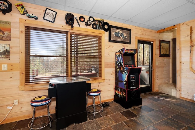 327 Dancing Trees Trl, Morganton, GA 30560 - dining area featuring wood walls and stone tile flooring