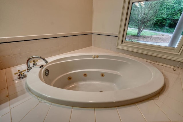 full bathroom with a jetted tub
