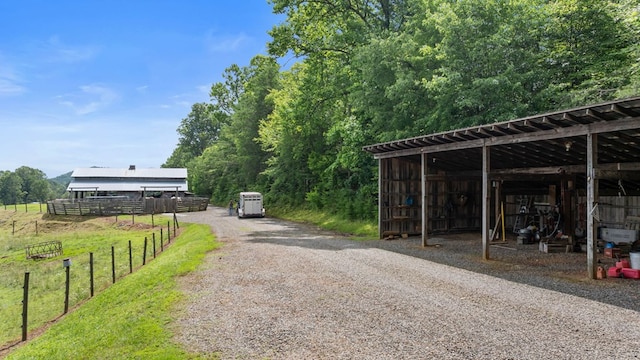 102 Cross Creek Ln, Warne, NC 28909 - view of dirt / gravel road featuring a pole building