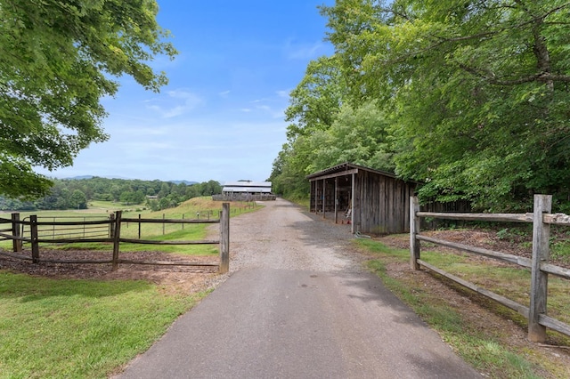 102 Cross Creek Ln, Warne, NC 28909 - view of asphalt driveway with an exterior structure and a view of rural / pastoral area