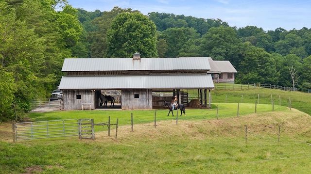 102 Cross Creek Ln, Warne, NC 28909 - horse barn featuring a wooded view and a view of rural / pastoral area