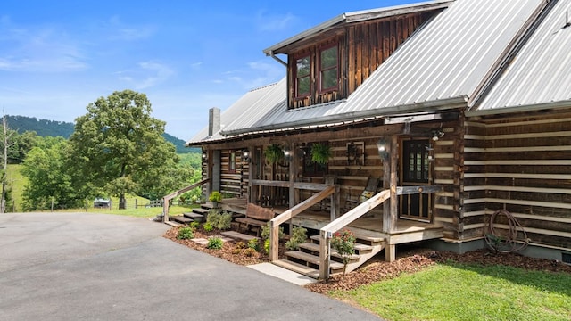 102 Cross Creek Ln, Warne, NC 28909 - view of side of home with log exterior and a metal roof