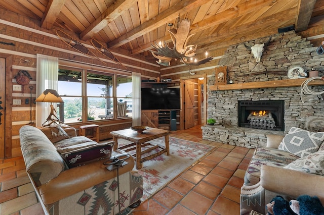 102 Cross Creek Ln, Warne, NC 28909 - living room featuring a wooden ceiling with exposed beams, wood walls, tile patterned flooring, a fireplace, and a chandelier