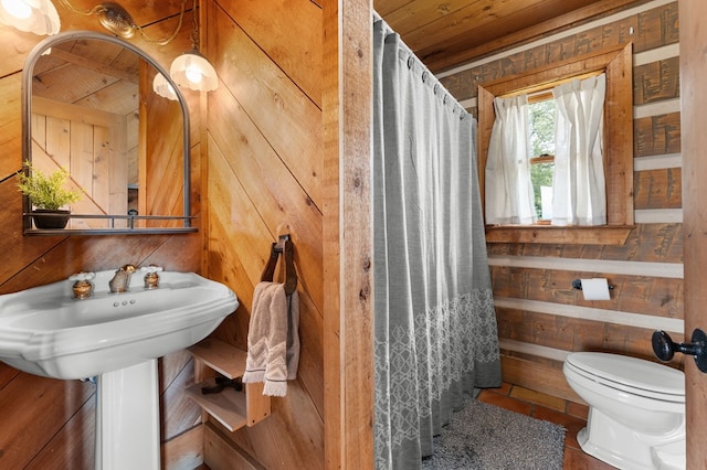 102 Cross Creek Ln, Warne, NC 28909 - bathroom with wooden ceiling, wood walls, and curtained shower