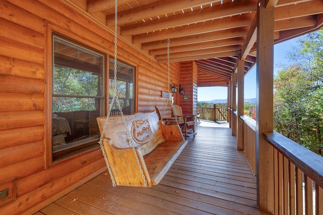 deck with covered porch