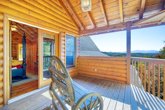 wooden terrace with a mountain view