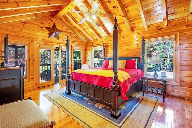 192 Oak Ridge Way, Morganton, GA 30560 - bedroom featuring multiple windows, access to outside, wooden walls, wood ceiling, and hardwood / wood-style flooring