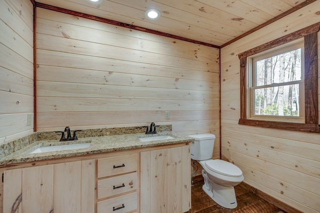 bathroom featuring hardwood / wood-style flooring, toilet, wood ceiling, wood walls, and vanity