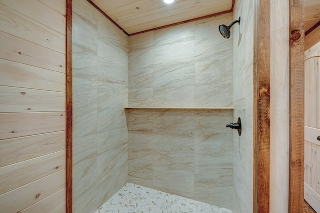 bathroom with a tile shower