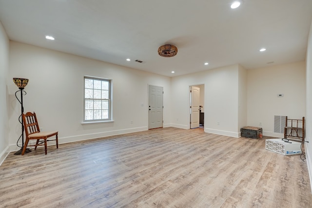 sitting room featuring light wood-type flooring