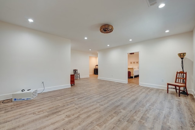 unfurnished room with light hardwood / wood-style floors